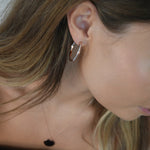Angled Hoop Earrings with a softly sculpted organic silhouette, available in sterling silver, gold vermeil and rose gold vermeil.