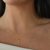 Gold vermeil angled hoop pendant necklace with a modern circular pendant on a delicate chain.