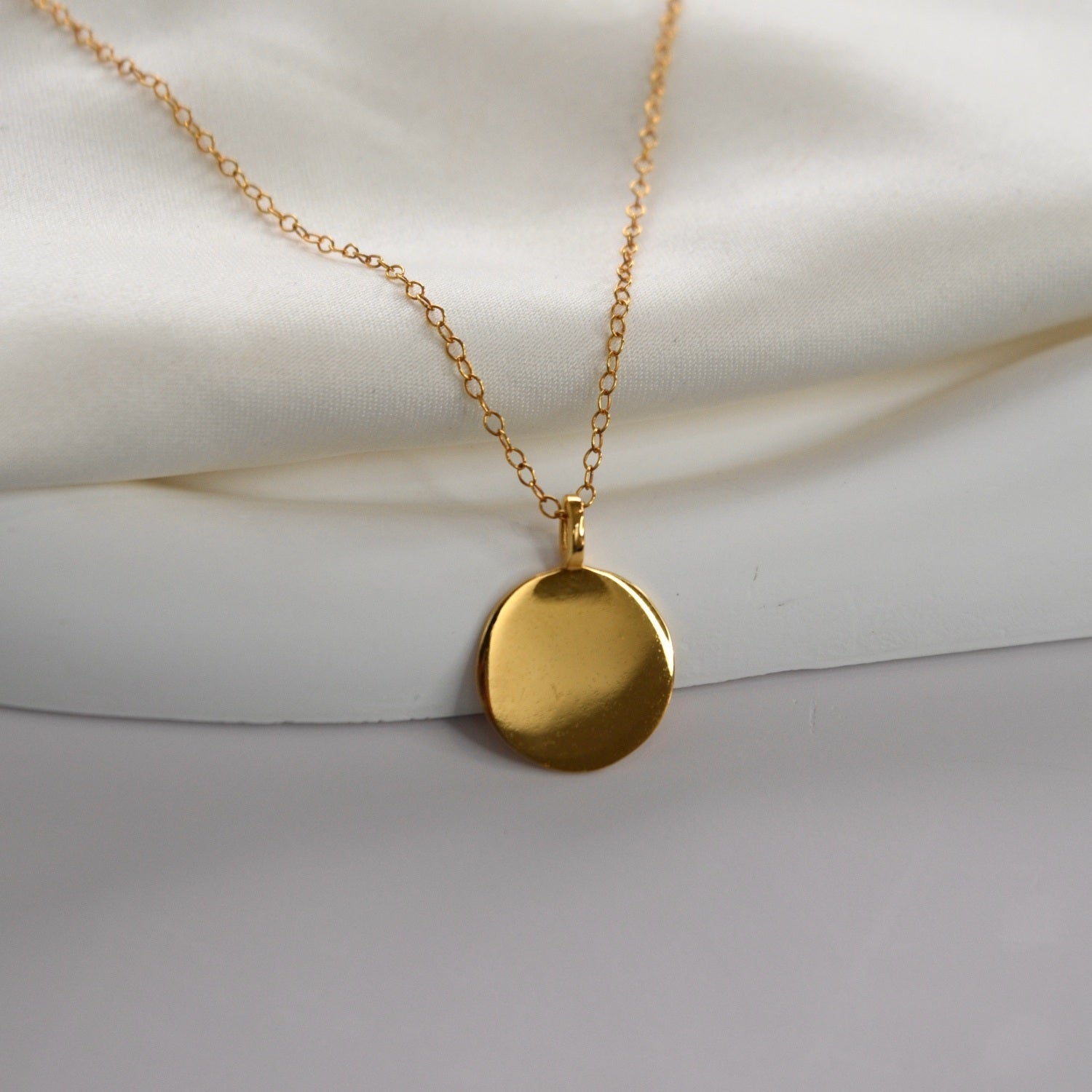 Disc Pendant Necklace with a polished round pendant, available in sterling silver, gold vermeil and rose gold vermeil.