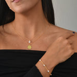 Disc Pendant Necklace with a polished round pendant, available in sterling silver, gold vermeil and rose gold vermeil.
