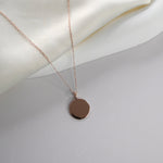 Disc Pendant Necklace with a polished round pendant, available in sterling silver, gold vermeil and rose gold vermeil.