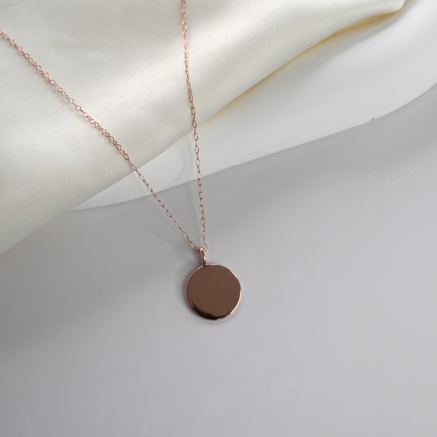 Disc Pendant Necklace with a polished round pendant, available in sterling silver, gold vermeil and rose gold vermeil.