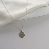 Disc Pendant Necklace with a polished round pendant, available in sterling silver, gold vermeil and rose gold vermeil.