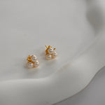 Freshwater Pearl Clover Stud Earrings with three cultured pearls in a delicate clover design.