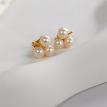Freshwater Pearl Clover Stud Earrings with three cultured pearls in a delicate clover design.
