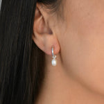 Freshwater Pearl Drop Huggie Earrings with removable cultured freshwater pearl drops.