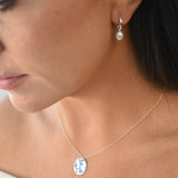Freshwater Pearl Drop Huggie Earrings with removable cultured freshwater pearl drops.
