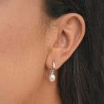 Freshwater Pearl Drop Huggie Earrings with removable cultured freshwater pearl drops.