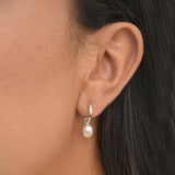 Freshwater Pearl Drop Huggie Earrings with removable cultured freshwater pearl drops.