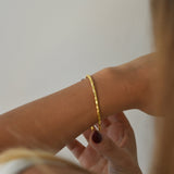 Hammered Bangle with an organic textured finish, available in sterling silver, gold vermeil and rose gold vermeil.