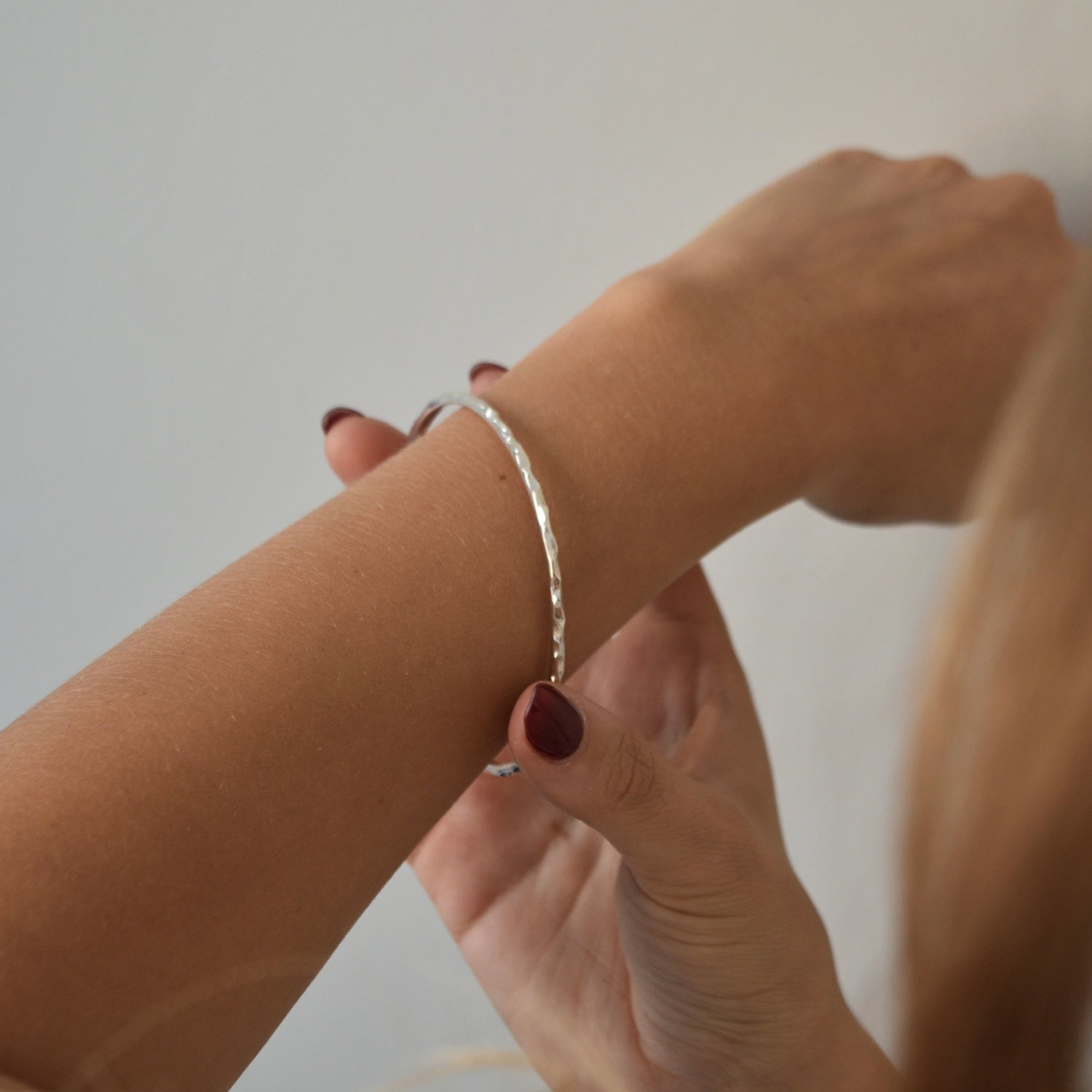 Hammered Bangle with an organic textured finish, available in sterling silver, gold vermeil and rose gold vermeil.