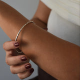 Hammered Bangle with an organic textured finish, available in sterling silver, gold vermeil and rose gold vermeil.