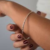 Hammered Bangle with an organic textured finish, available in sterling silver, gold vermeil and rose gold vermeil. 