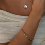 Hammered Bangle with an organic textured finish, available in sterling silver, gold vermeil and rose gold vermeil.