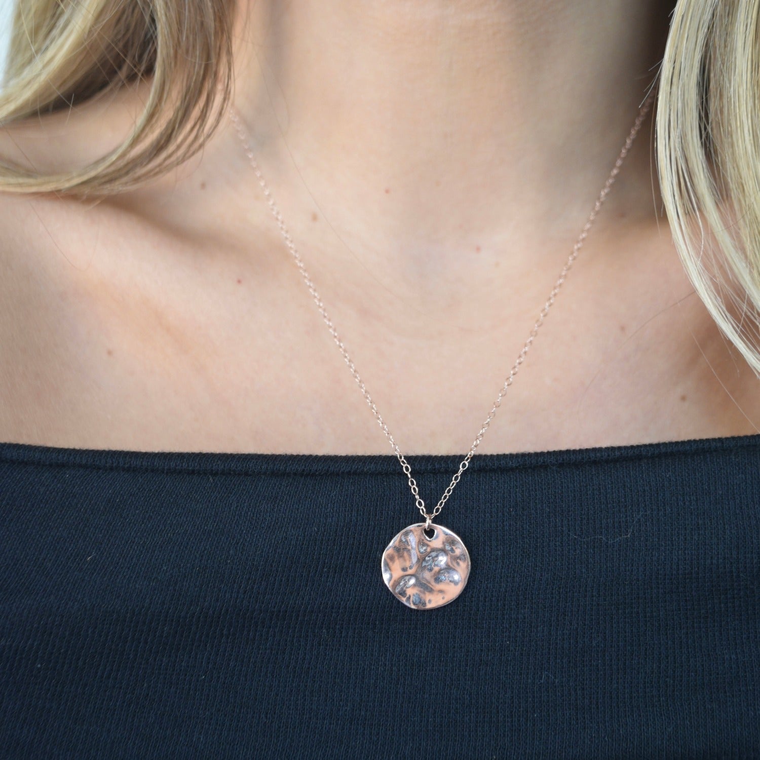 Hammered Disc Pendant Necklace with a textured circular pendant on a delicate chain.