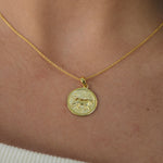 Lioness Pendant Necklace featuring a detailed lioness motif, available in gold vermeil and sterling silver.