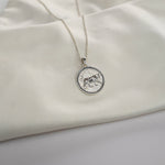Lioness Pendant Necklace featuring a detailed lioness motif, available in gold vermeil and sterling silver.