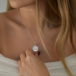 Lioness Pendant Necklace featuring a detailed lioness motif, available in gold vermeil and sterling silver.