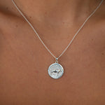 Lioness Pendant Necklace featuring a detailed lioness motif, available in gold vermeil and sterling silver.