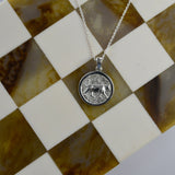 Lioness Pendant Necklace featuring a detailed lioness motif, available in gold vermeil and sterling silver.