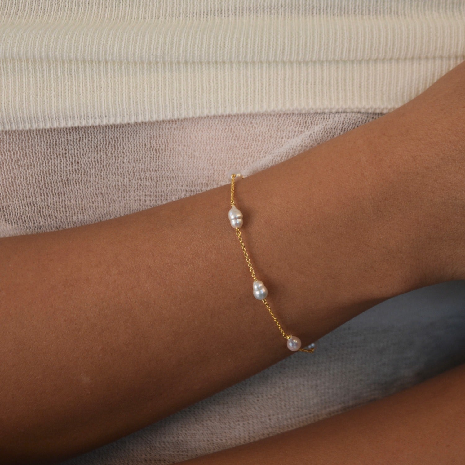 Nova Freshwater Ivory Pearl Bracelet featuring lustrous ivory freshwater pearls on a delicate gold vermeil chain.