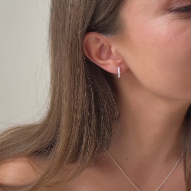 silver huggie hexagon earrings video showing fine cz detailing 