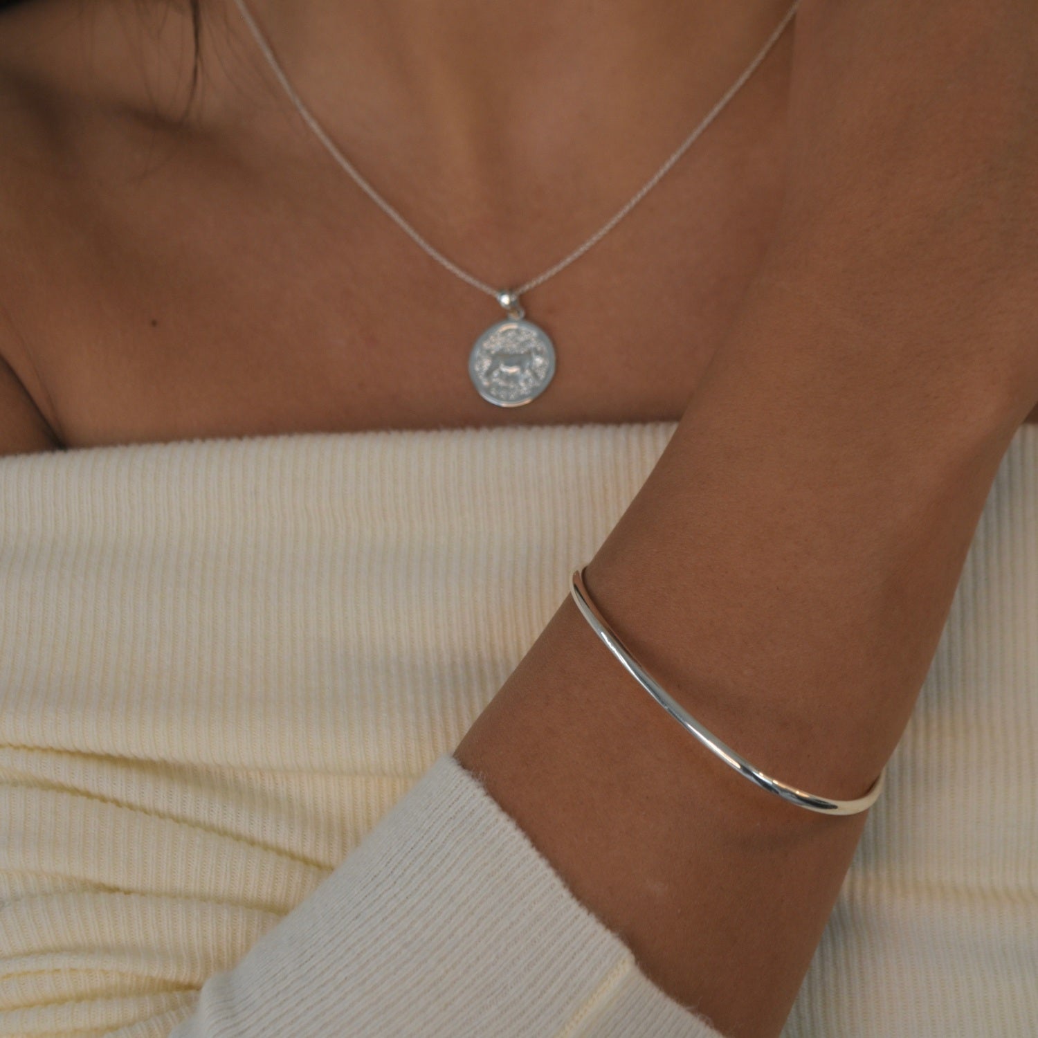 Signature Bangle with a softly sculpted organic silhouette, available in sterling silver, gold vermeil and rose gold vermeil.