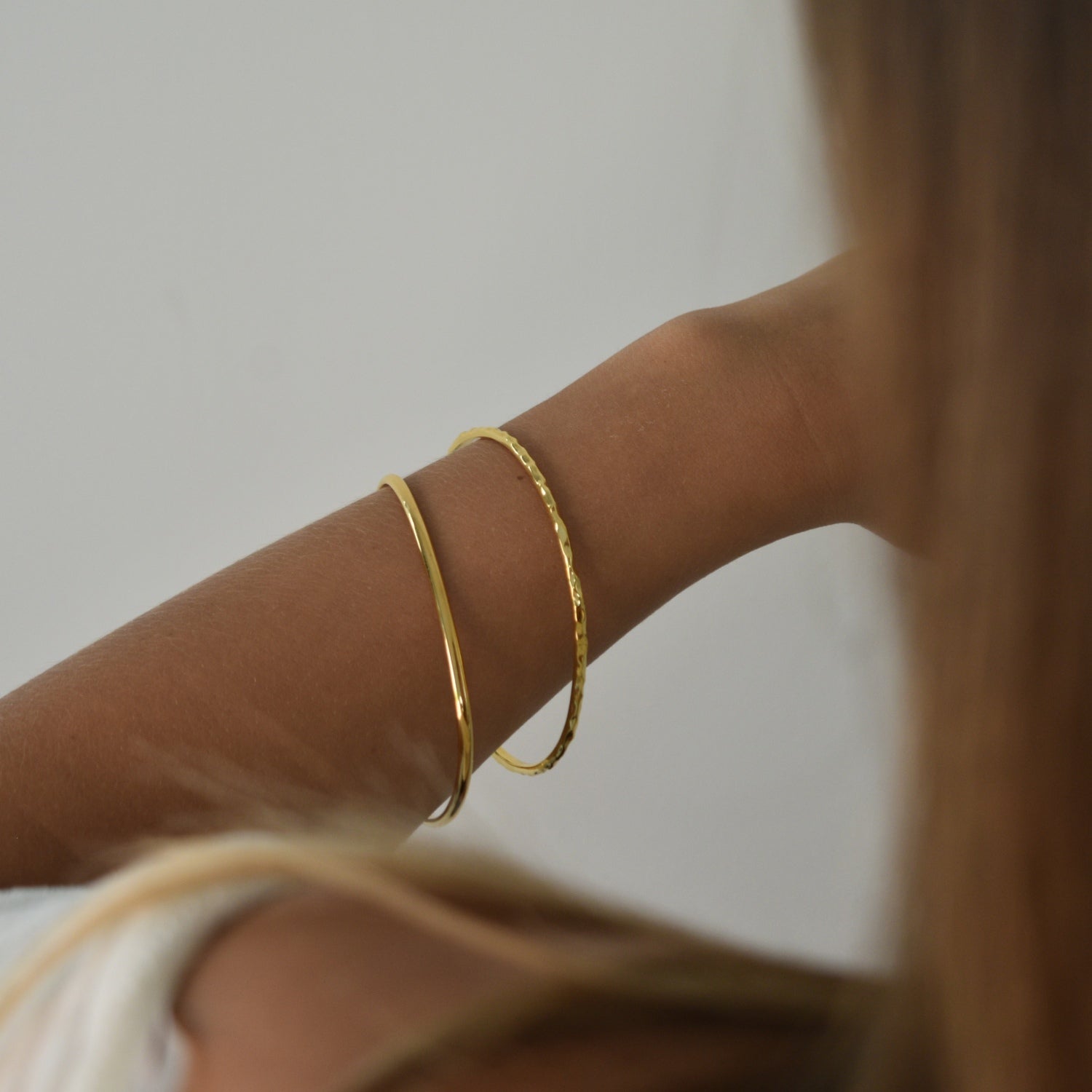 Signature Bangle with a softly sculpted organic silhouette, available in sterling silver, gold vermeil and rose gold vermeil.
