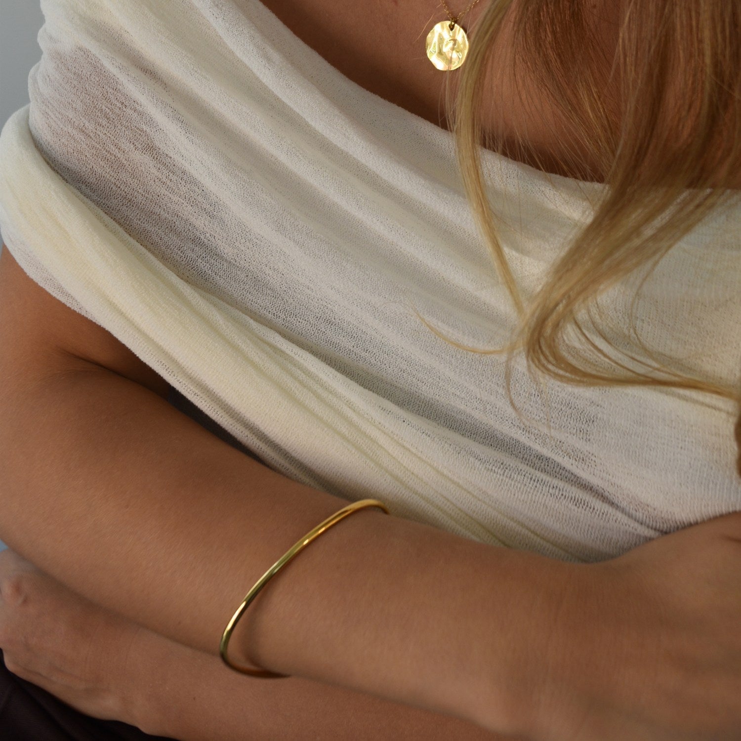 Signature Bangle with a softly sculpted organic silhouette, available in sterling silver, gold vermeil and rose gold vermeil.