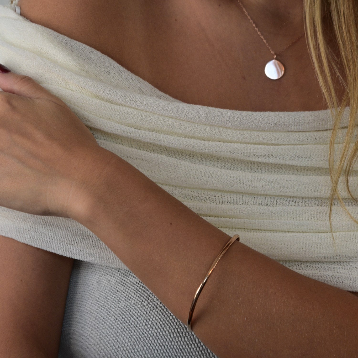 Signature Bangle with a softly sculpted organic silhouette, available in sterling silver, gold vermeil and rose gold vermeil.