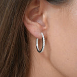Sterling Silver Slim CZ Huggie Earrings close up detail 
