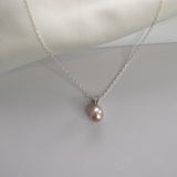 White Gold Drop Pearl Necklace with a lustrous freshwater pearl pendant on a delicate sterling silver chain.