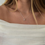 White Gold Drop Pearl Necklace with a lustrous freshwater pearl pendant on a delicate sterling silver chain.